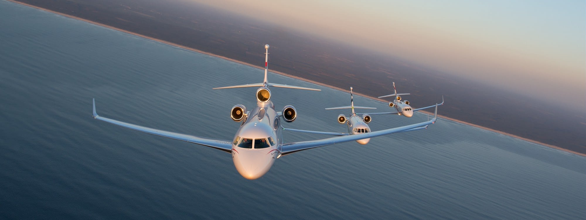 Falcon 2000S, Falcon 7X et Falcon 900LX en vol.