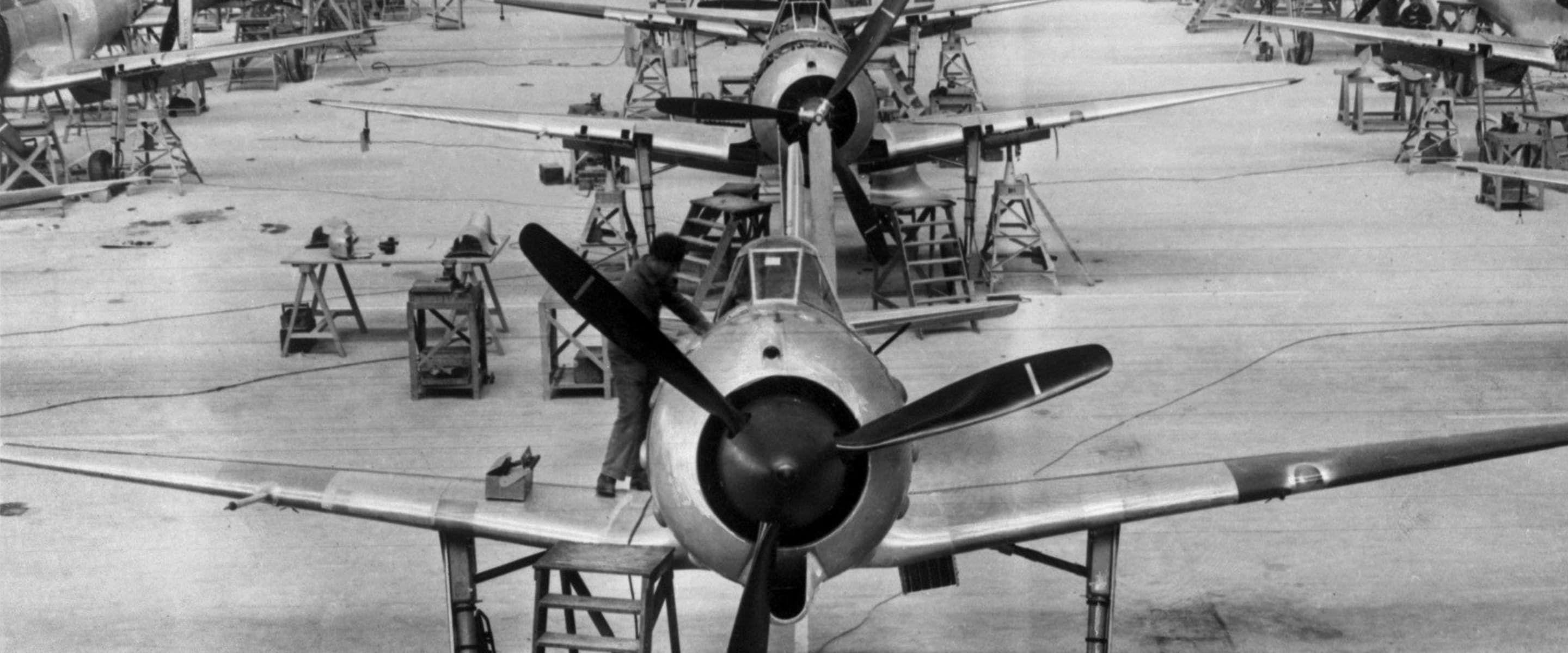 Sheet metal workers building parts of a Bloch MB-151/MB-152 fighter at the SNCASO factory in Châteauroux-Déols.