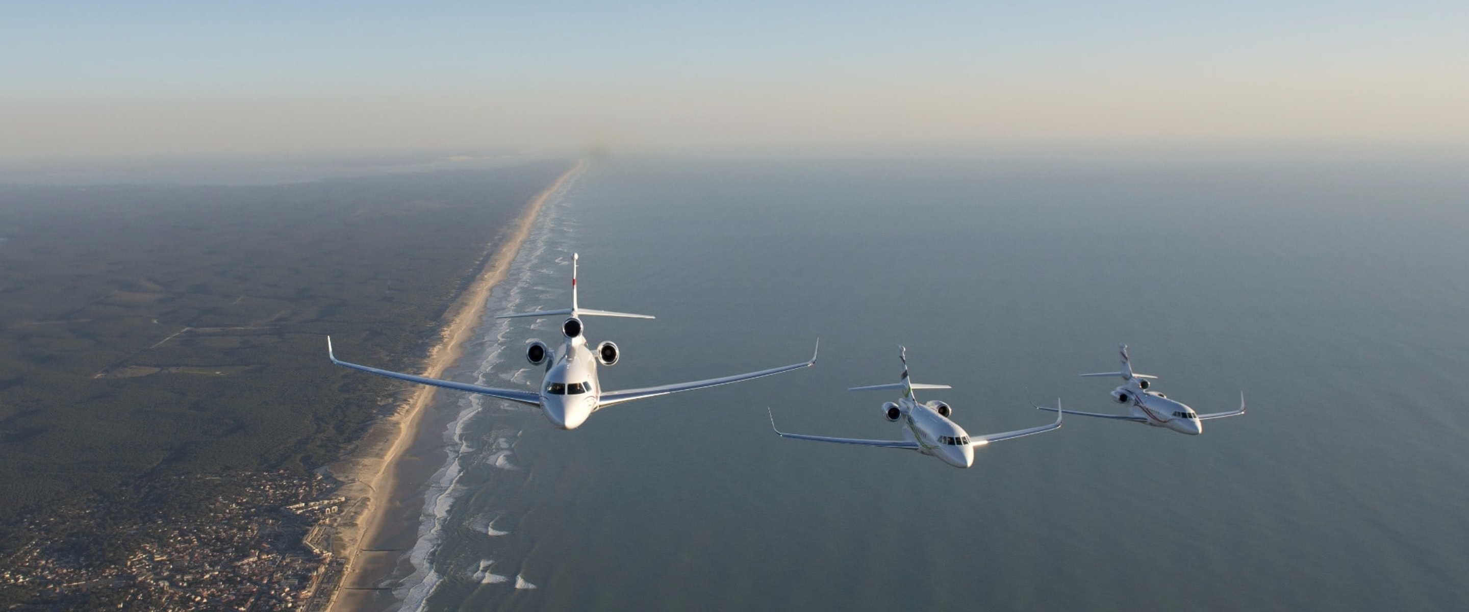 Falcon 2000S, Falcon 7X and Falcon 900LX in flight.