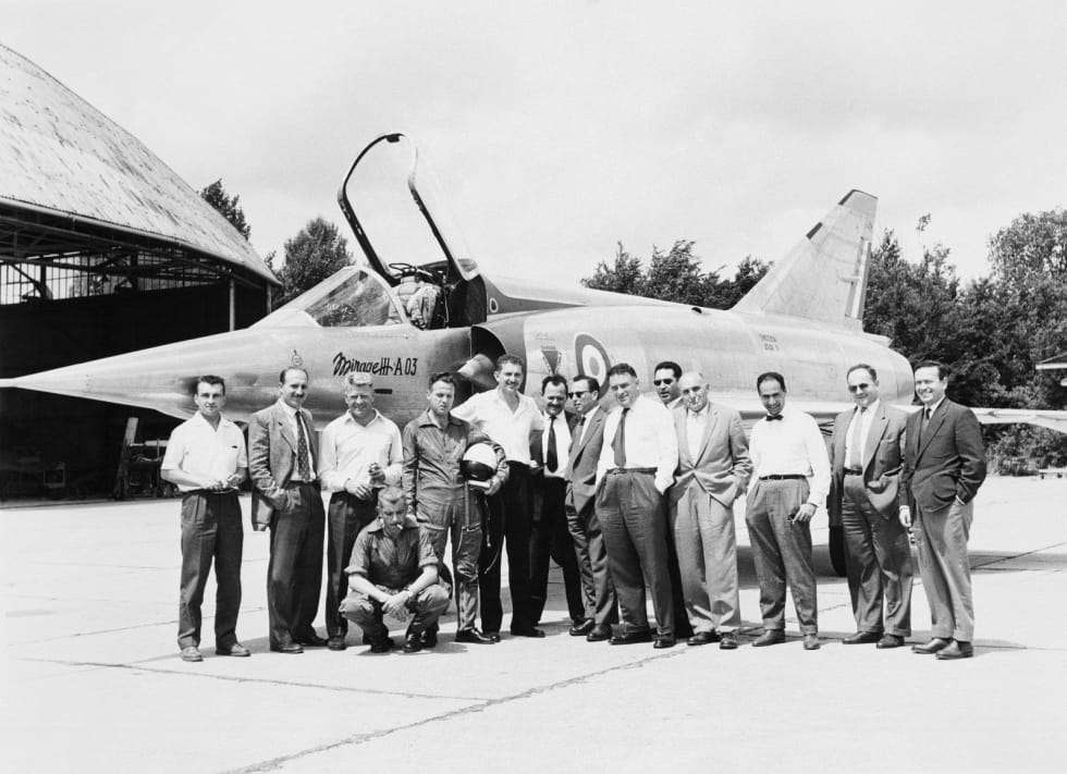 Mirage III A 03. Jean Coureau, Gérard Muselli, Roland Glavany (squatting), Daniel Shapira, Ezer Weizman, CEV pilot, Benno-Claude Vallières and Serge Dassault in Villaroche.